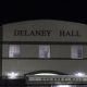 Delaney Hall building at night with lit windows
