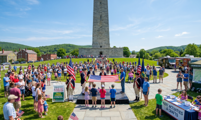 Flag Day celebration at Vermont monument with crowd