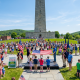 Flag Day celebration at Vermont monument with crowd