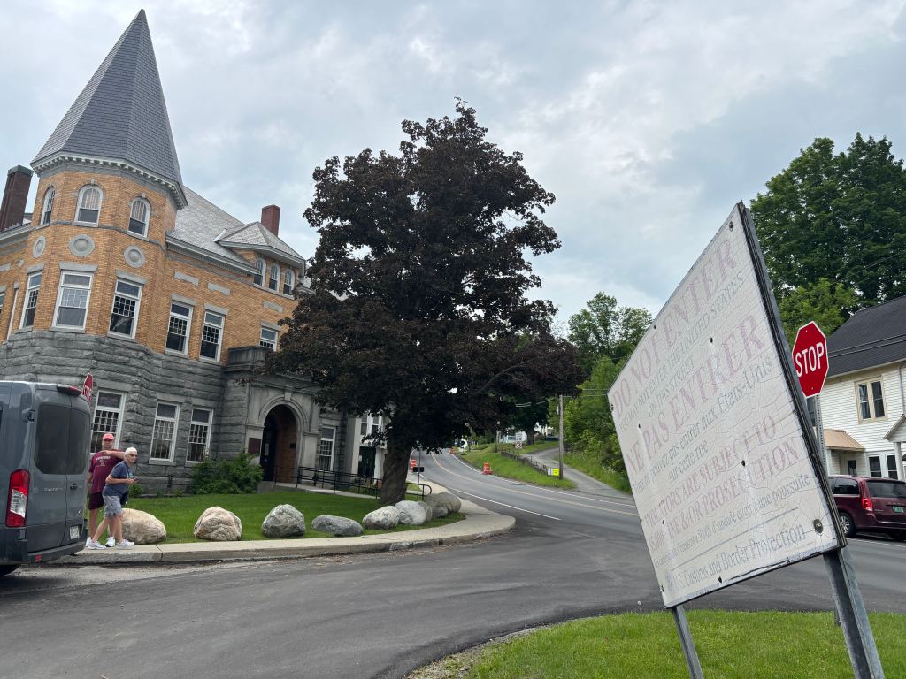 Historic brick building with turret at intersection