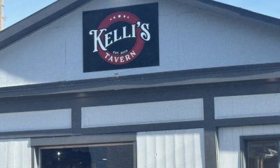 Kelli's Tavern sign on building facade