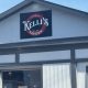 Kelli's Tavern sign on building facade