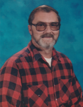 Man with glasses in red plaid shirt