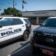 Burlington police SUVs parked outside police department