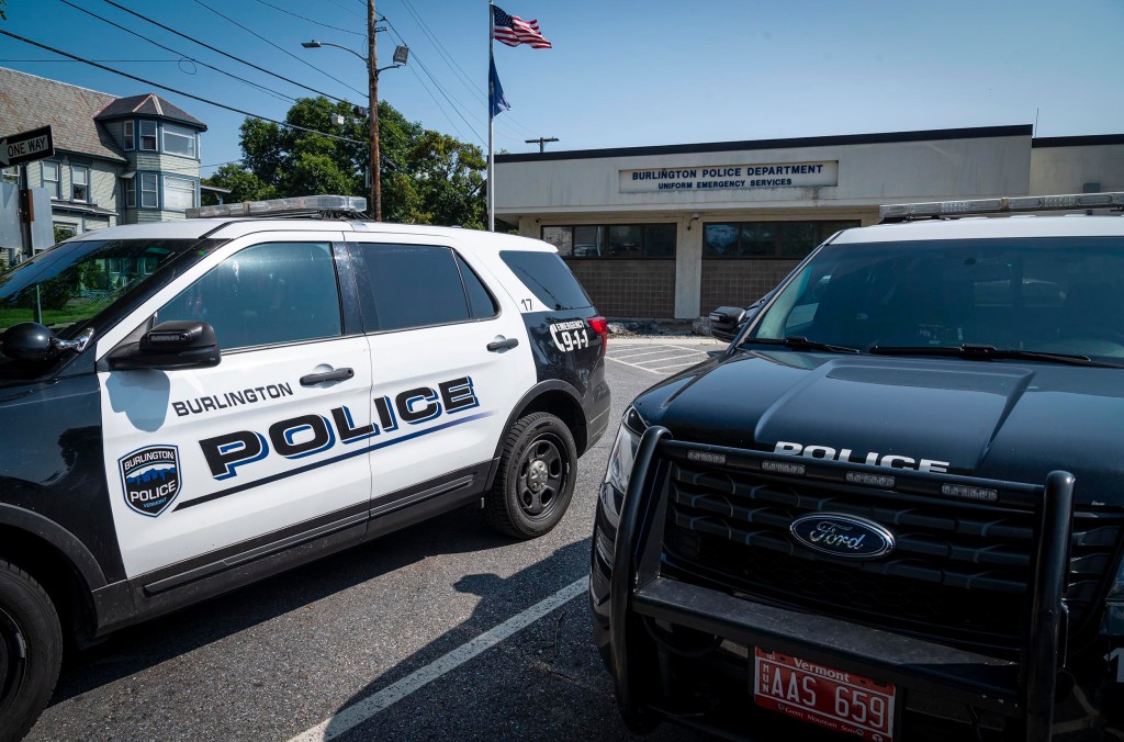 Burlington police SUVs parked outside police department