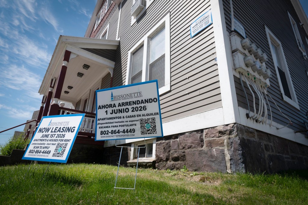 Now leasing signs outside residential house