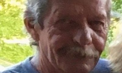 Older man with gray hair outdoors