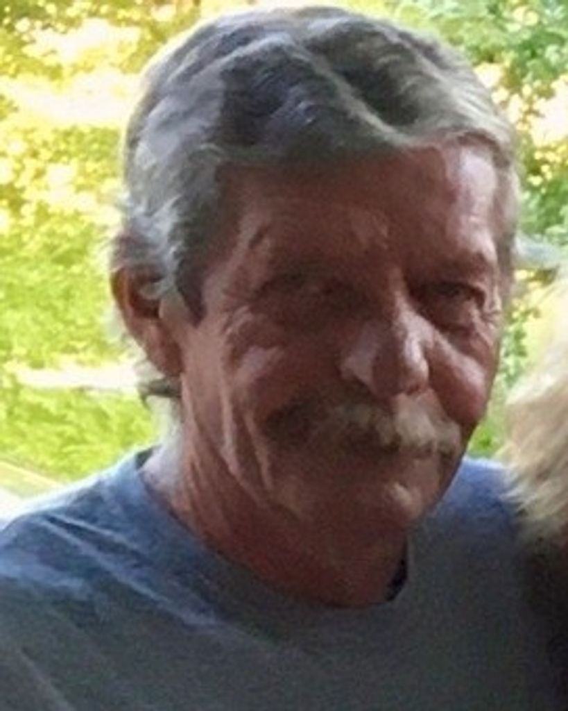 Older man with gray hair outdoors