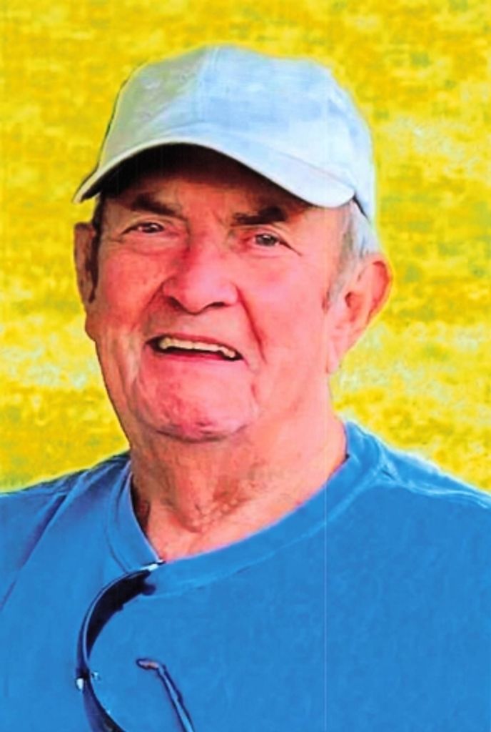Elderly man in blue cap smiling outdoors