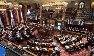 Ornate legislative chamber during government session