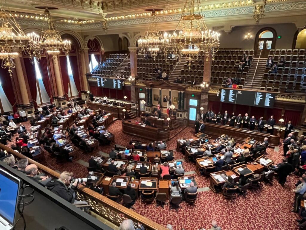 Ornate legislative chamber during government session
