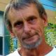 Close-up portrait of middle-aged man outdoors