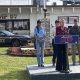 Press conference outside Camp 57 with ICE vehicle
