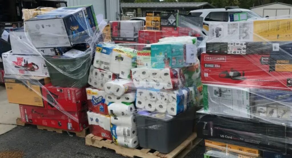 Shrink-wrapped pallets of assorted household goods and tools