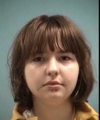 Portrait of young woman with brown bob haircut