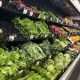 A grocery store produce section filled with various types of fresh greens and vegetables, includ — food recalls Bennington