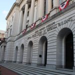 Exterior view of the U.S. Court of Appeals building with decorative banners, symbolizing leg — telehealth abortion lawsuit