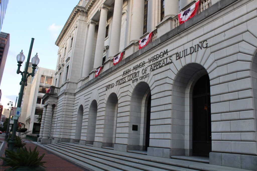 Exterior view of the U.S. Court of Appeals building with decorative banners, symbolizing leg — telehealth abortion lawsuit