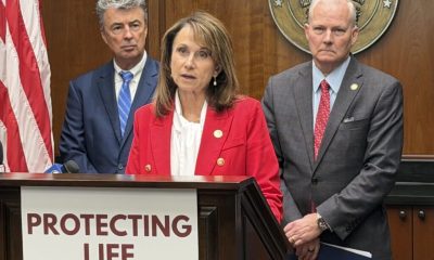 Louisiana Attorney General Liz Murrill speaks at a podium labeled 'Protecting — Massachusetts abortion shield law lawsuit