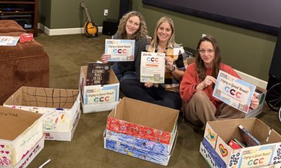 Three women sitting on the floor with decorated boxes, promoting a screen-free ch — screen-free childhood Croton-on-Hudson