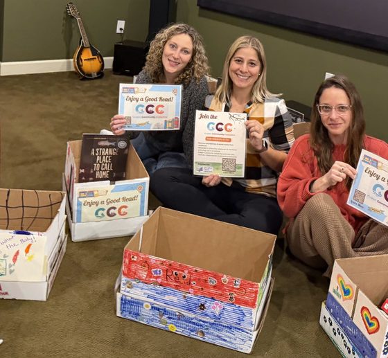 Three women sitting on the floor with decorated boxes, promoting a screen-free ch — screen-free childhood Croton-on-Hudson