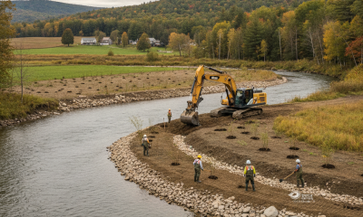 Conservation crews and heavy machinery working on the Batten Kill Restoration in S — Batten Kill Restoration Sunderland VT