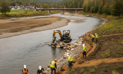 Workers restoring the Batten Kill River with heavy machinery and planting along — Batten Kill River Restoration Sunderland