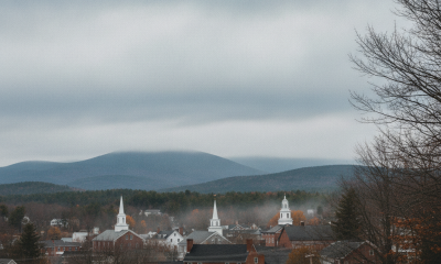 Overcast skies loom over a small town in Bennington, Vermont, with church steeples visibl — Bennington VT weather forecast