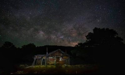 Rustic cabin under Milky Way night sky — Escambia County aging population