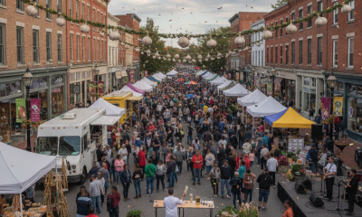 Crowd gathered at Garlic Town USA festival in downtown Bennington, with food stalls and live music.