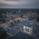 Aerial view of a small town with surveillance technology, including drones and — how 9/11 changed government surveillance