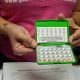 Person holding open birth control pill pack — florida reproductive healthcare access