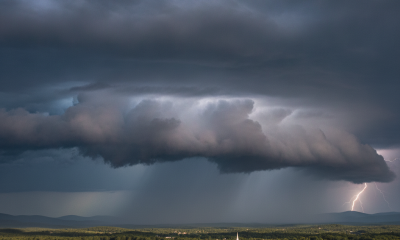 Dramatic storm clouds over a rural landscape with lightning in the distance, i — severe thunderstorm warning Bennington VT