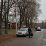 A man approaches a silver Subaru Forester parked near Shaftsbury Elementary School, w — Shaftsbury Elementary School Theft