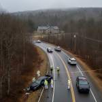 Emergency responders investigate a fatal crash scene on a winding road in Ve — Vermont State Police Shaftsbury fatal crash