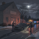 Two Vermont State Police officers investigating a car involved in a Bennington DUI crash at night, with police vehicles in…