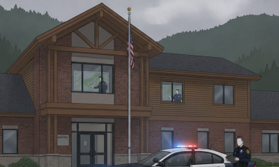 Vermont State Police vehicle parked outside the Shaftsbury Barracks with officer — Shaftsbury Barracks Negligent Operation
