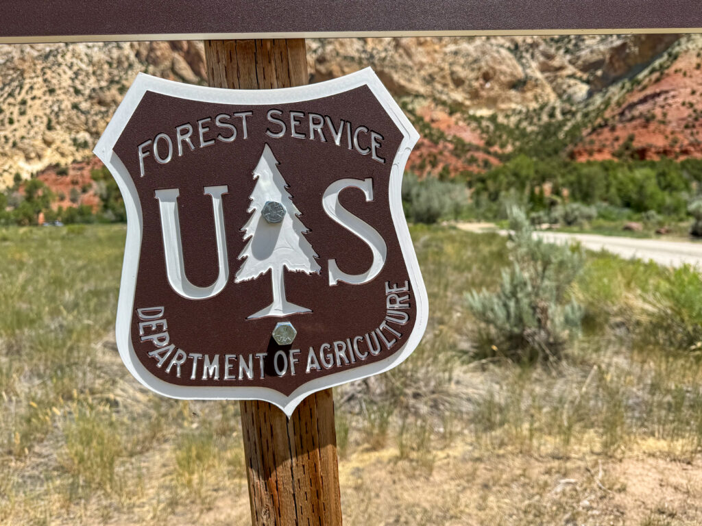Sign for the U.S. Forest Service, Department of Agriculture, with a mountainou — US Forest Service headquarters relocation