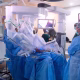 Medical staff in a hospital operating room amid the federal organ procurement organizations crackdown.