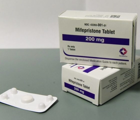 Mifepristone tablets in packaging, representing abortion pill restrictions and telehealth laws.