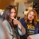 Chrissy Teigen Idaho abortion advocacy: Teigen speaks beside a woman wearing a “Yes” campaign shirt.