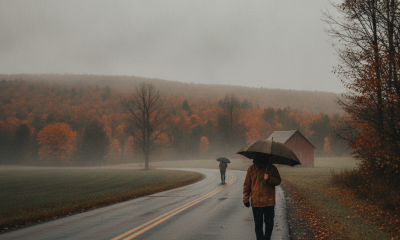 Two people walking along a misty road in Bennington County, VT, with autumn foliag — Bennington County VT weather forecast