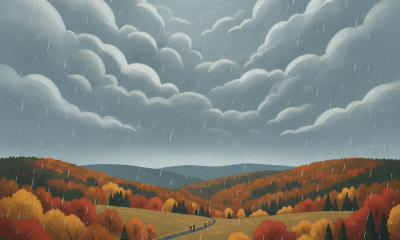 Two figures walking on a winding road under dark, cloudy skies with autumn foliage in vib — Bennington VT weather forecast