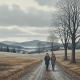 Two people walk along a leaf-strewn country road beneath bare trees and overcast skie — Bennington County weather forecast