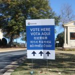 DHS voter investigations naturalized citizens story context: multilingual Gwinnett “Vote Here” sign outside a church p…