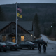 Two Vermont State Police officers walk near their barracks in Shaftsbury, V — Shaftsbury VT domestic assault investigation