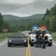 Illustration of two state troopers beside a patrol SUV and sports car on a wooded Vermont — Sunderland VT excessive speed